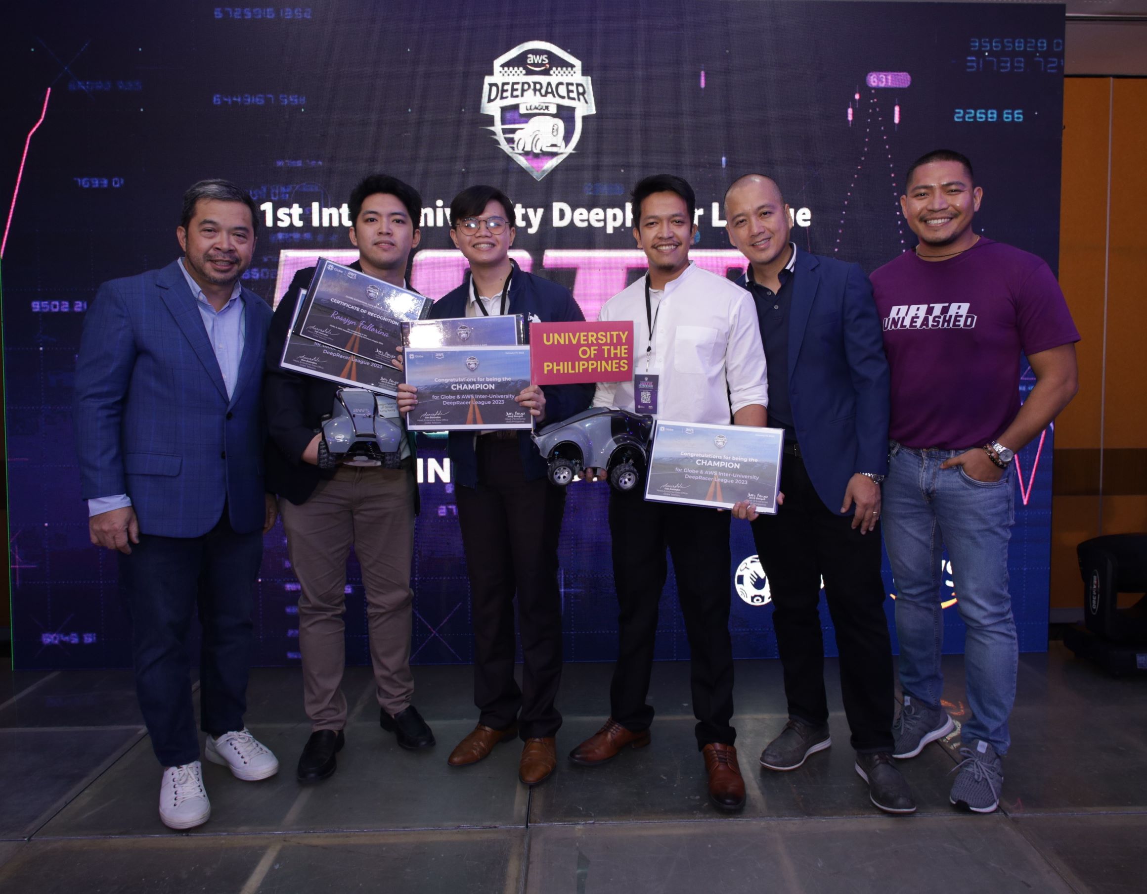 Virtual Race champions Team Turing Racing from University of the Philippines, Diliman.  Left to right: Dan Natindim, Globe Enterprise Data Office (EDO) VP; Team Turing Racing members Rossjyn Fallorina, Emmanuel Maminta and Nikko Carlo Yabut; Von Ryan Manalastas, AWS Account Manager; and Derick Adil, Head Globe EDO Strategy Execution Office.